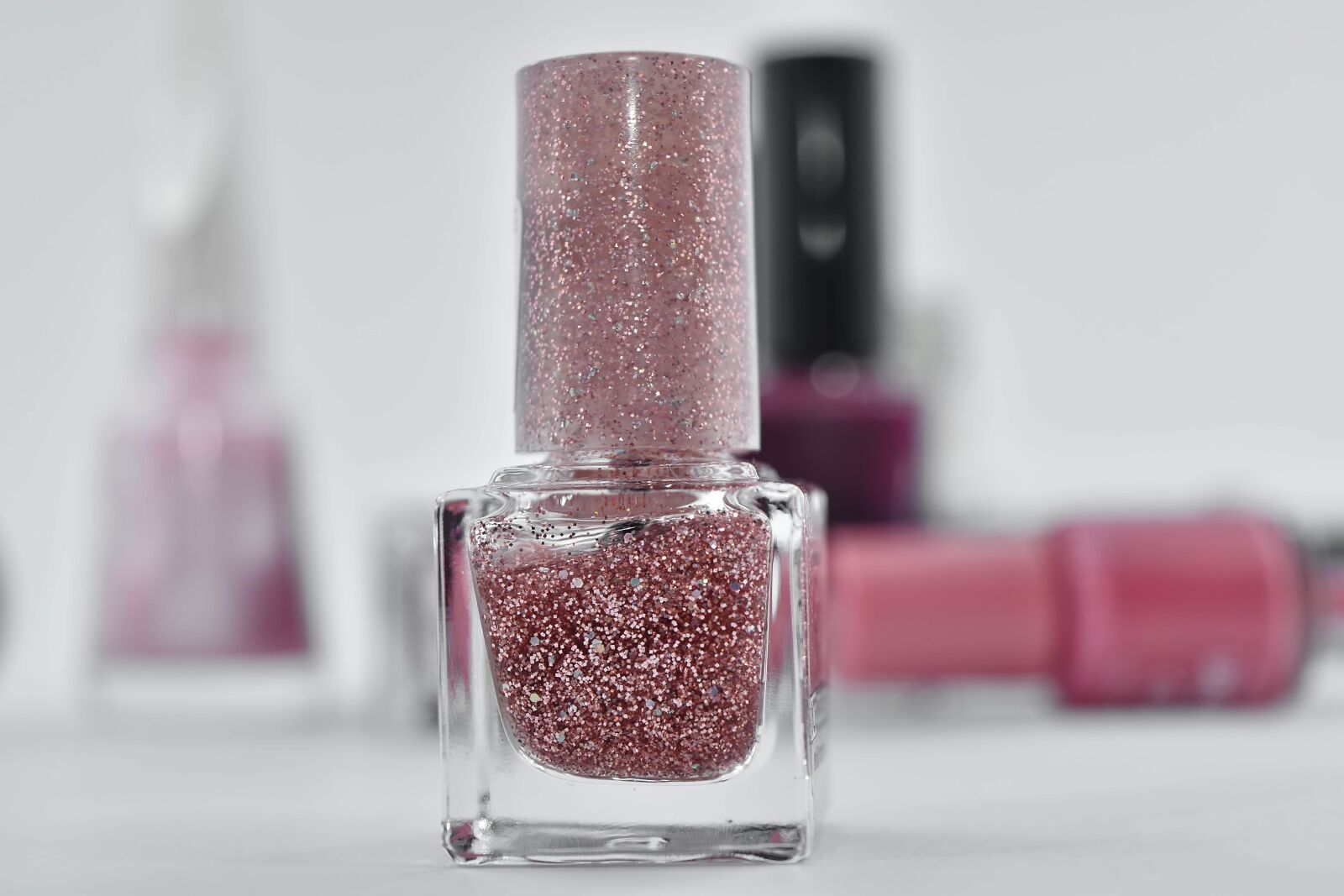 Nikon D5500 sample photo. Bottle, cosmetics, manicure, plush photography