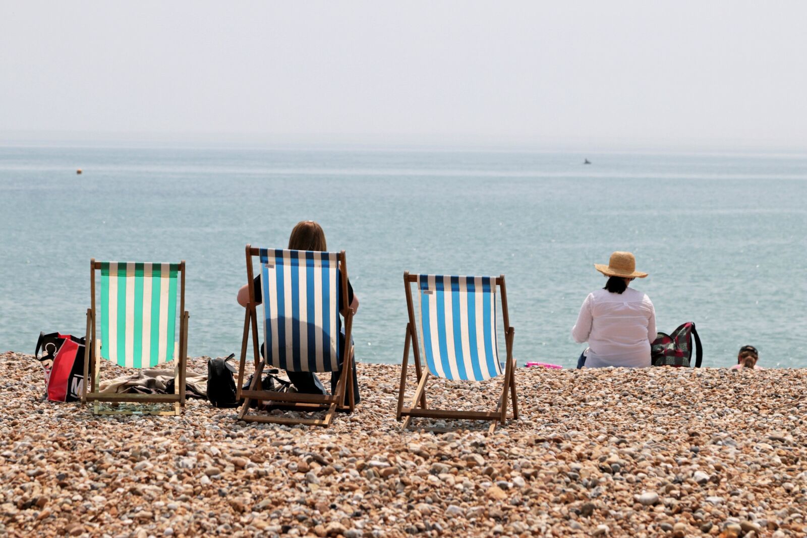 Canon EOS 80D + Canon EF 24-105mm F4L IS USM sample photo. Deck chairs, seaside, beach photography