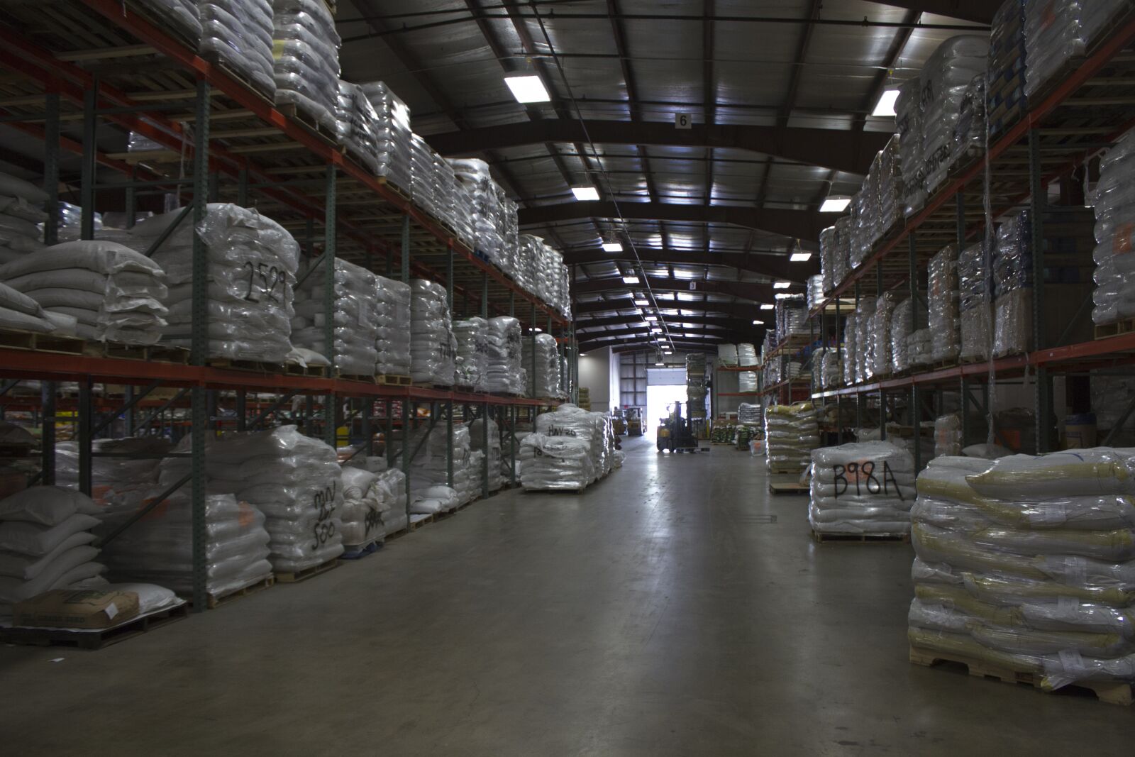 Canon EF-S 18-55mm F3.5-5.6 IS sample photo. Warehouse, seed, industry photography