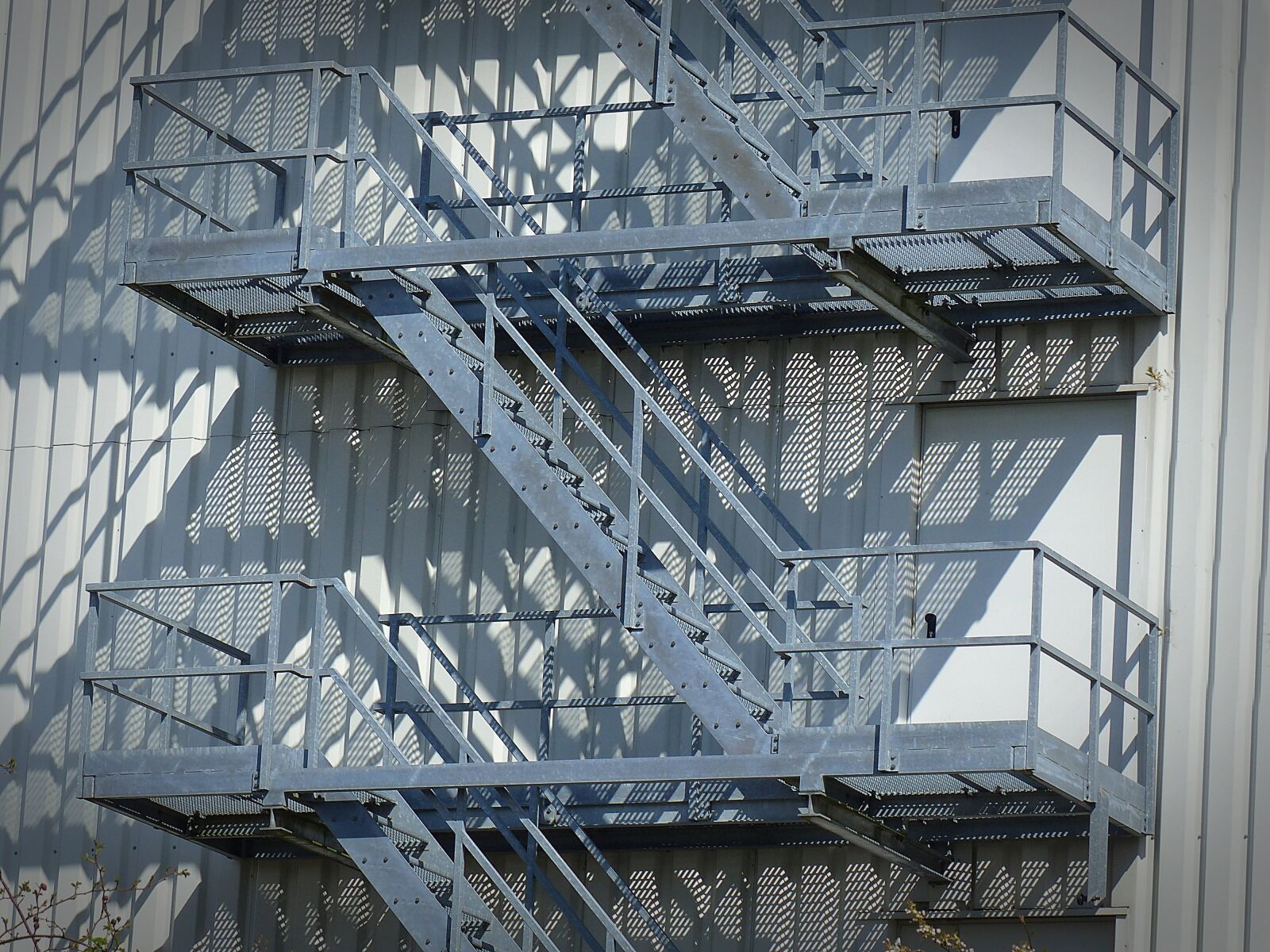 Panasonic Lumix DMC-FZ200 sample photo. Stairs, escape route, metal photography