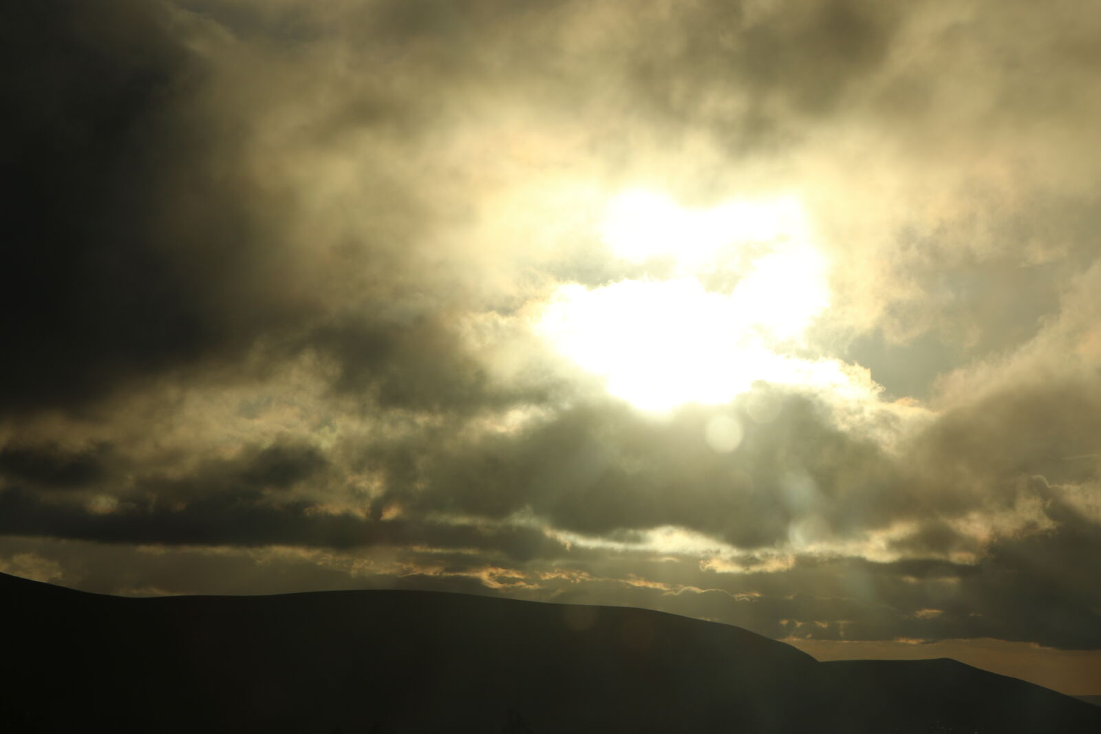 Canon EOS 7D Mark II sample photo. Clouds, golden, sun, mothernature photography