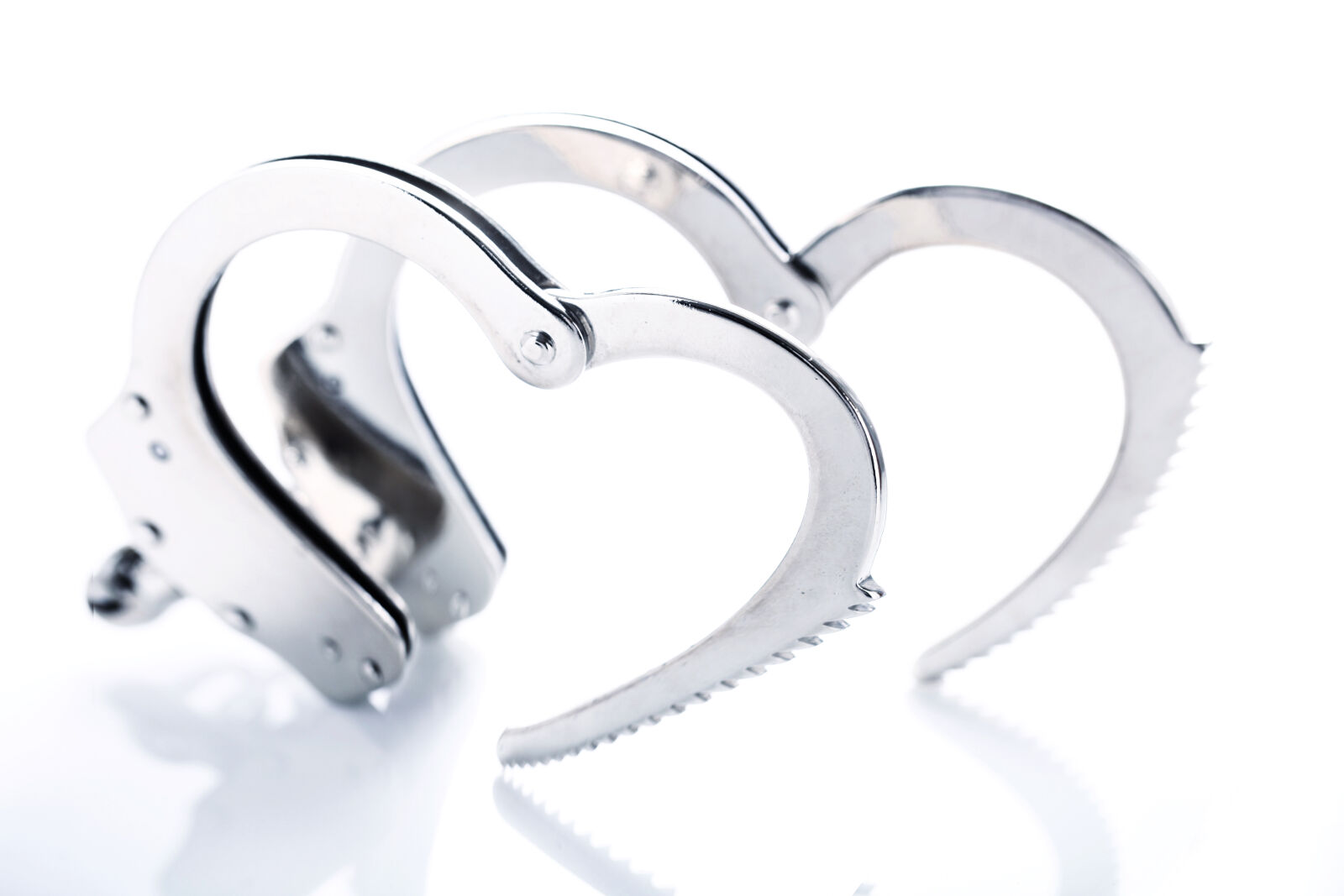 Canon EOS 5D Mark II + Canon EF 100mm F2.8L Macro IS USM sample photo. Crime, handcuffs, heart, limited photography
