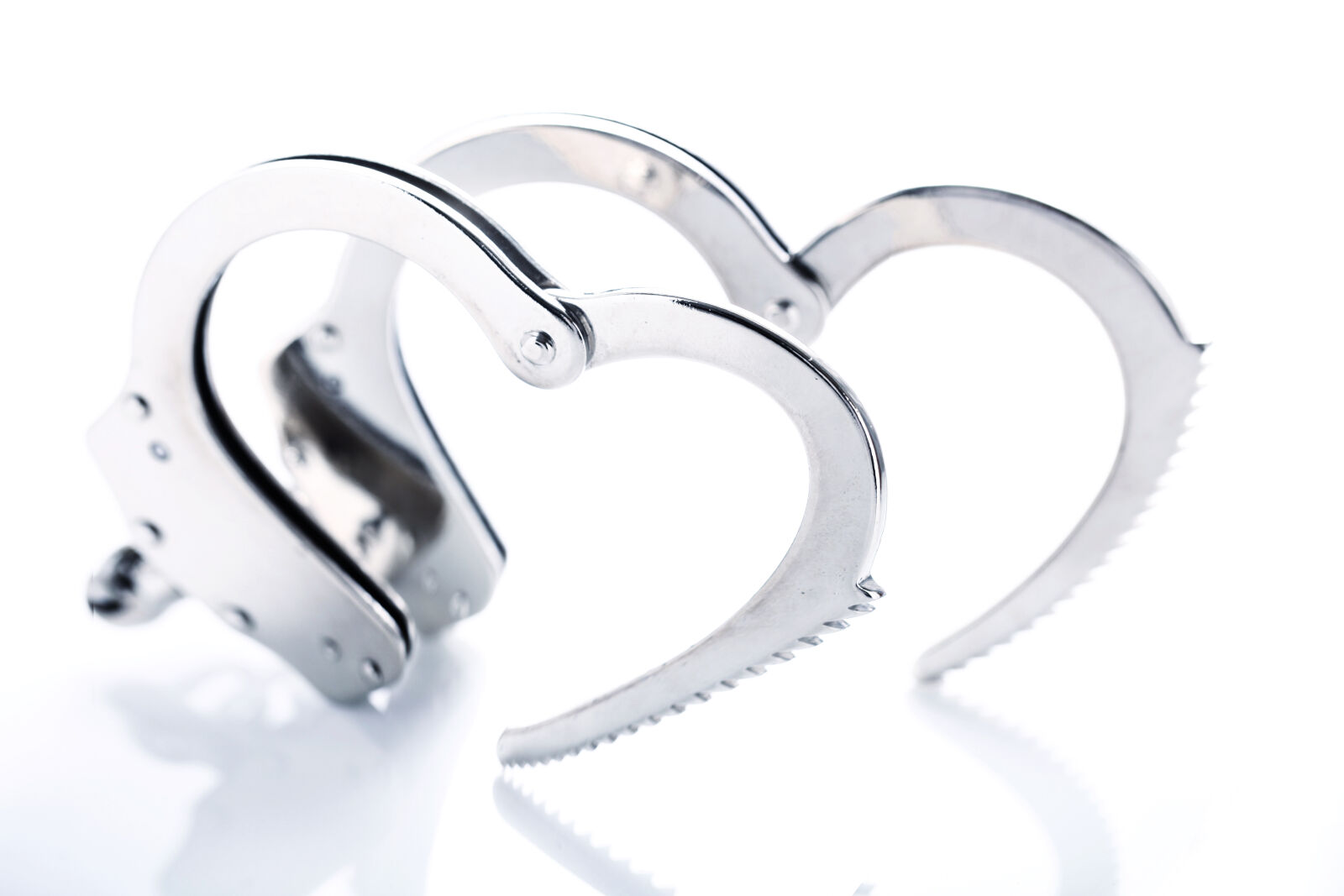 Canon EF 100mm F2.8L Macro IS USM sample photo. Crime, handcuffs, heart, limited photography