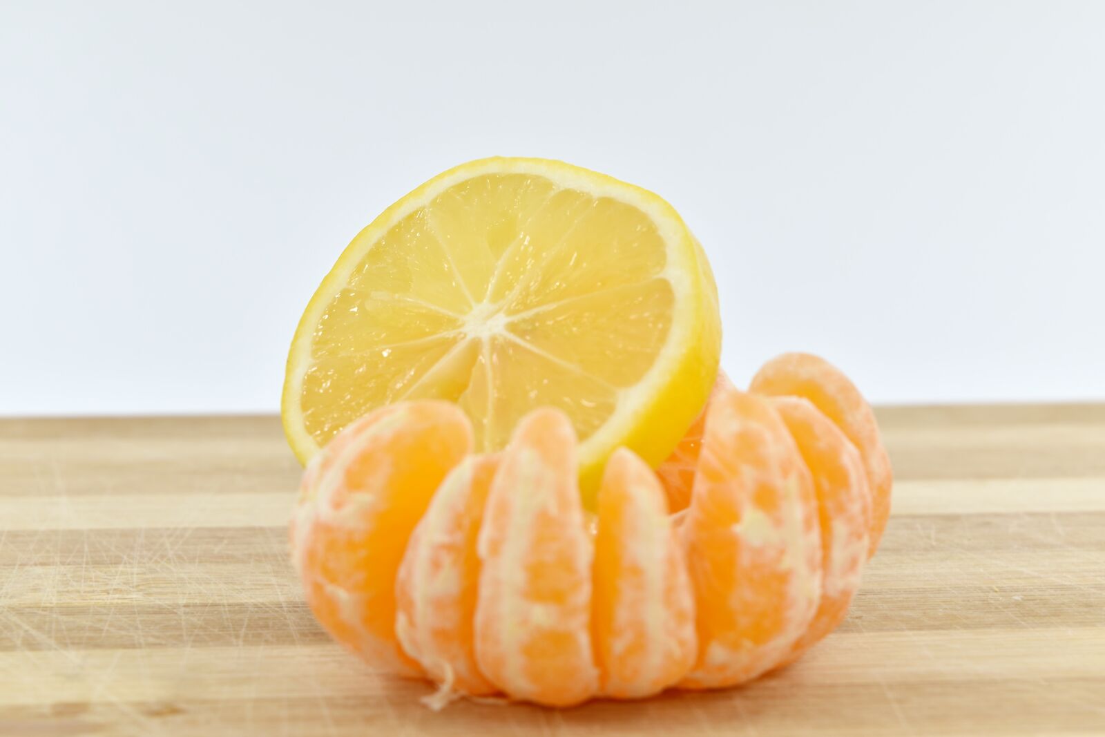 Nikon D5500 sample photo. Lemon, slice, tangerine, juice photography