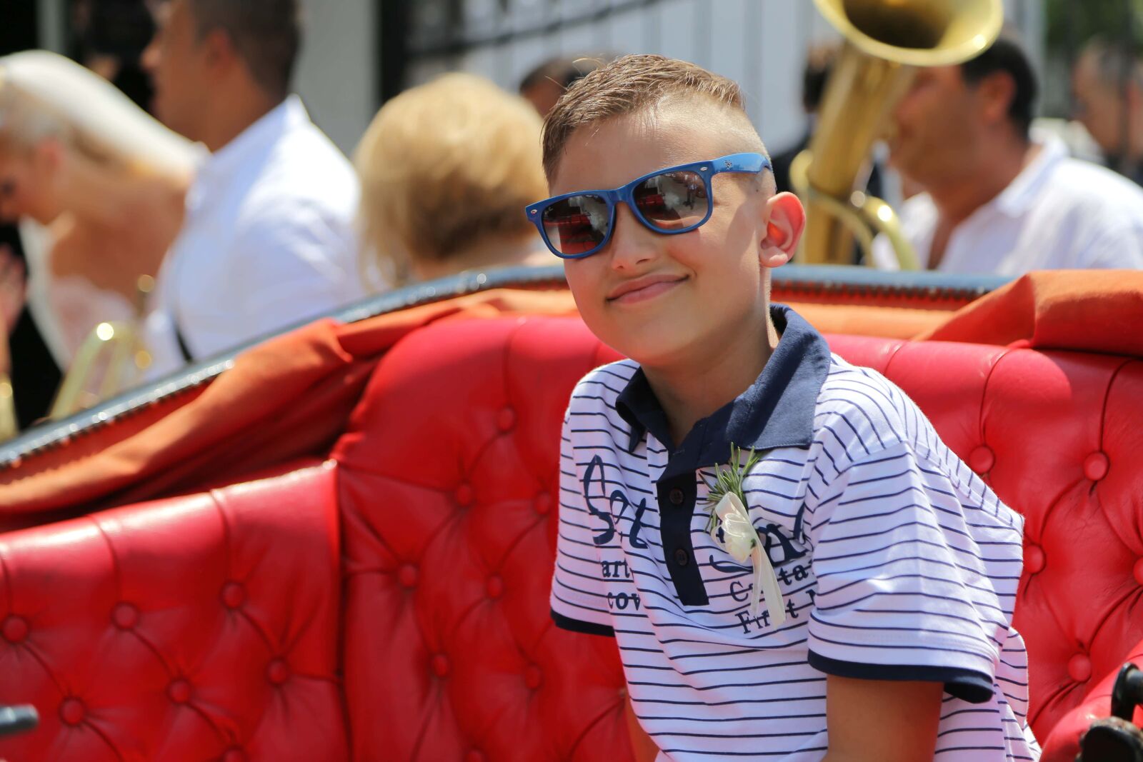 Canon EF 24-105mm F4L IS USM sample photo. Boy, smiling, ceremony, sunglasses photography