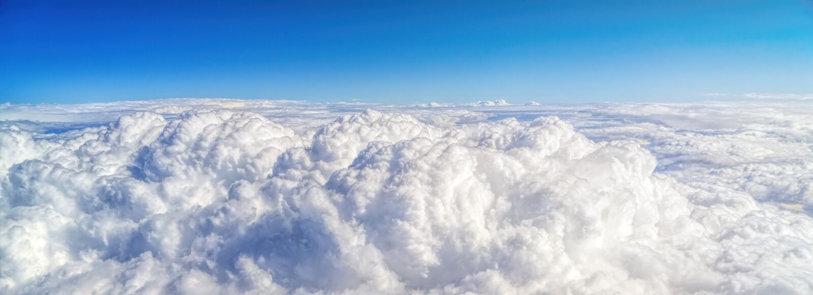 Sony a7 II + Sony FE 24-240mm F3.5-6.3 OSS sample photo. Clouds, sky, top photography