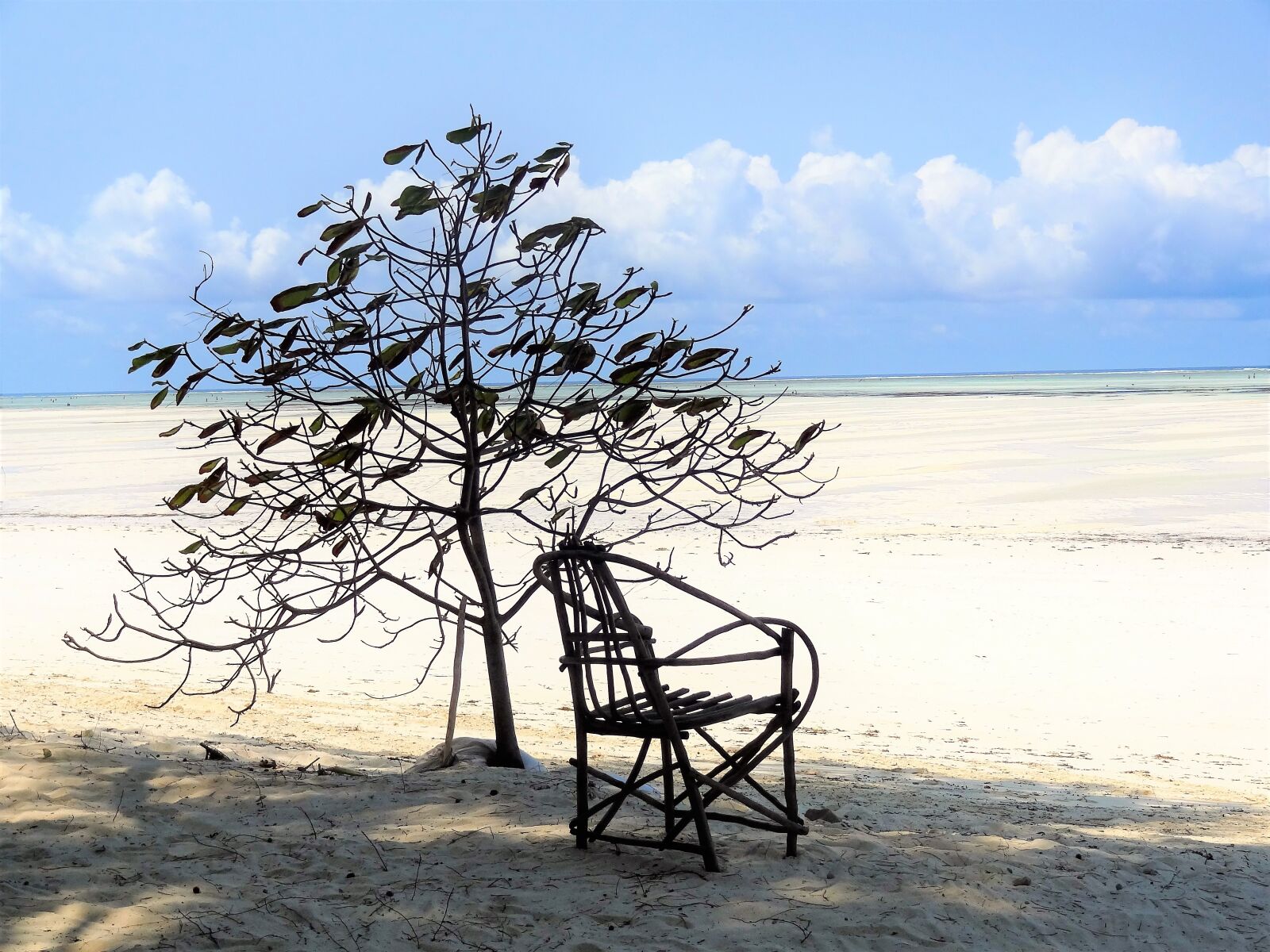 Sony Cyber-shot DSC-HX9V sample photo. Beach, sea, chair photography