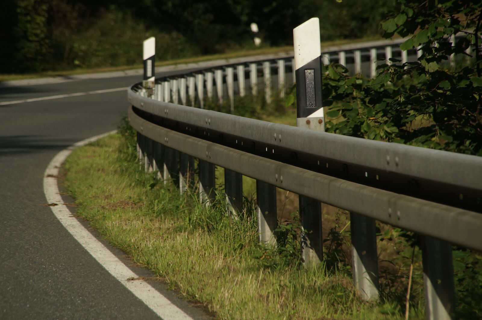 Sony SLT-A57 sample photo. Guard rail, motorcycle, accident photography