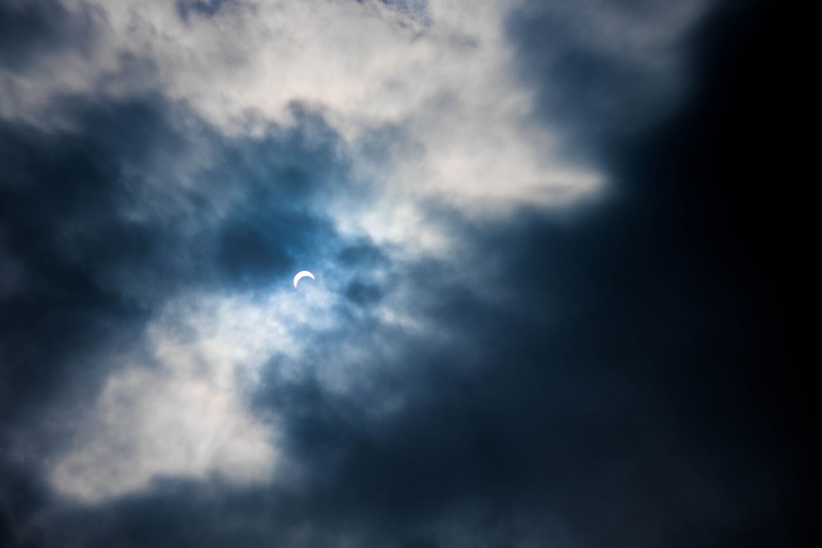 Fujifilm X-T1 + Fujifilm XF 60mm F2.4 R Macro sample photo. Solar eclipse, clouds, sky photography