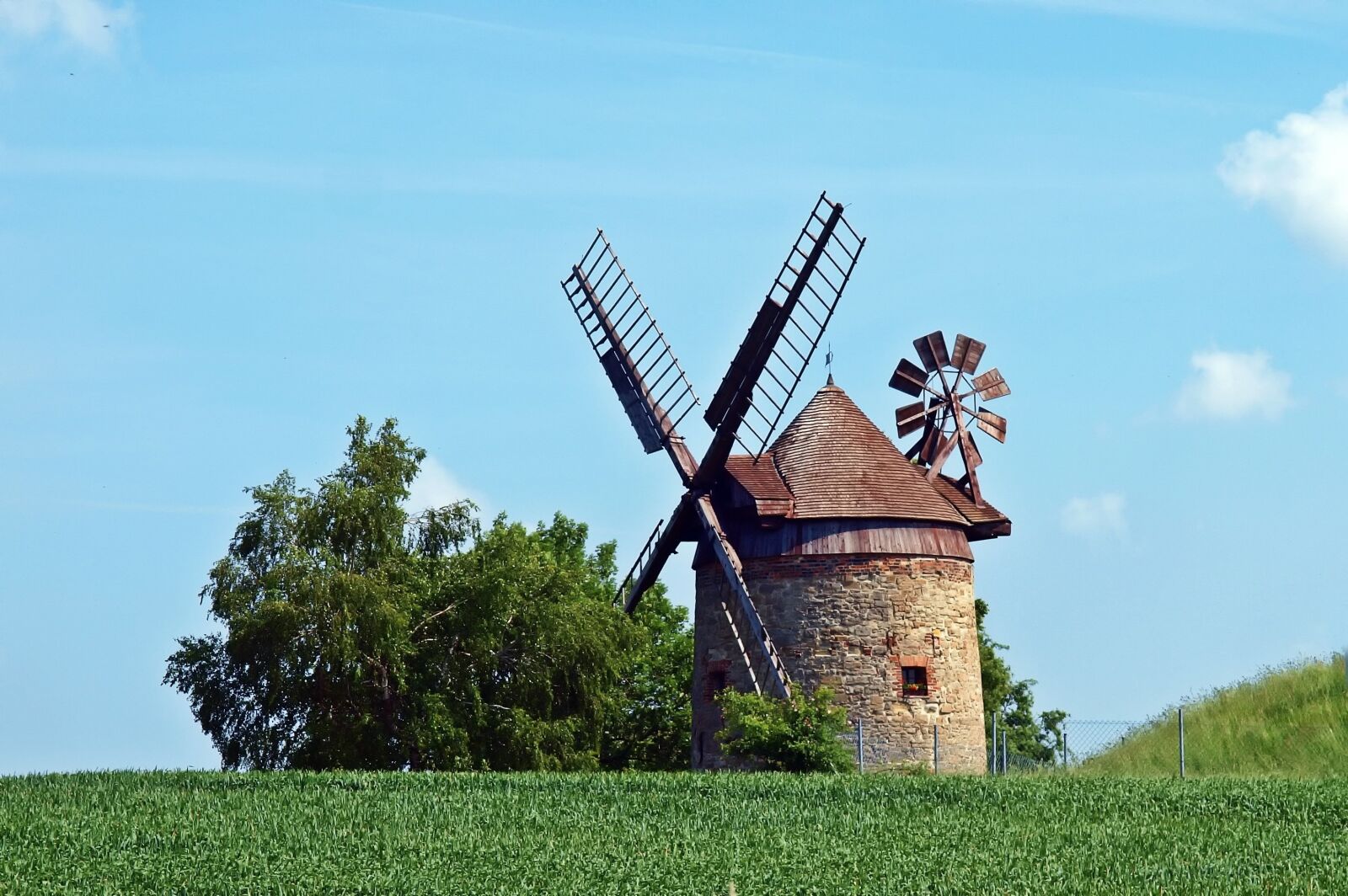 Olympus E-450 (EVOLT E-450) sample photo. Tower windmill, monument, protected photography