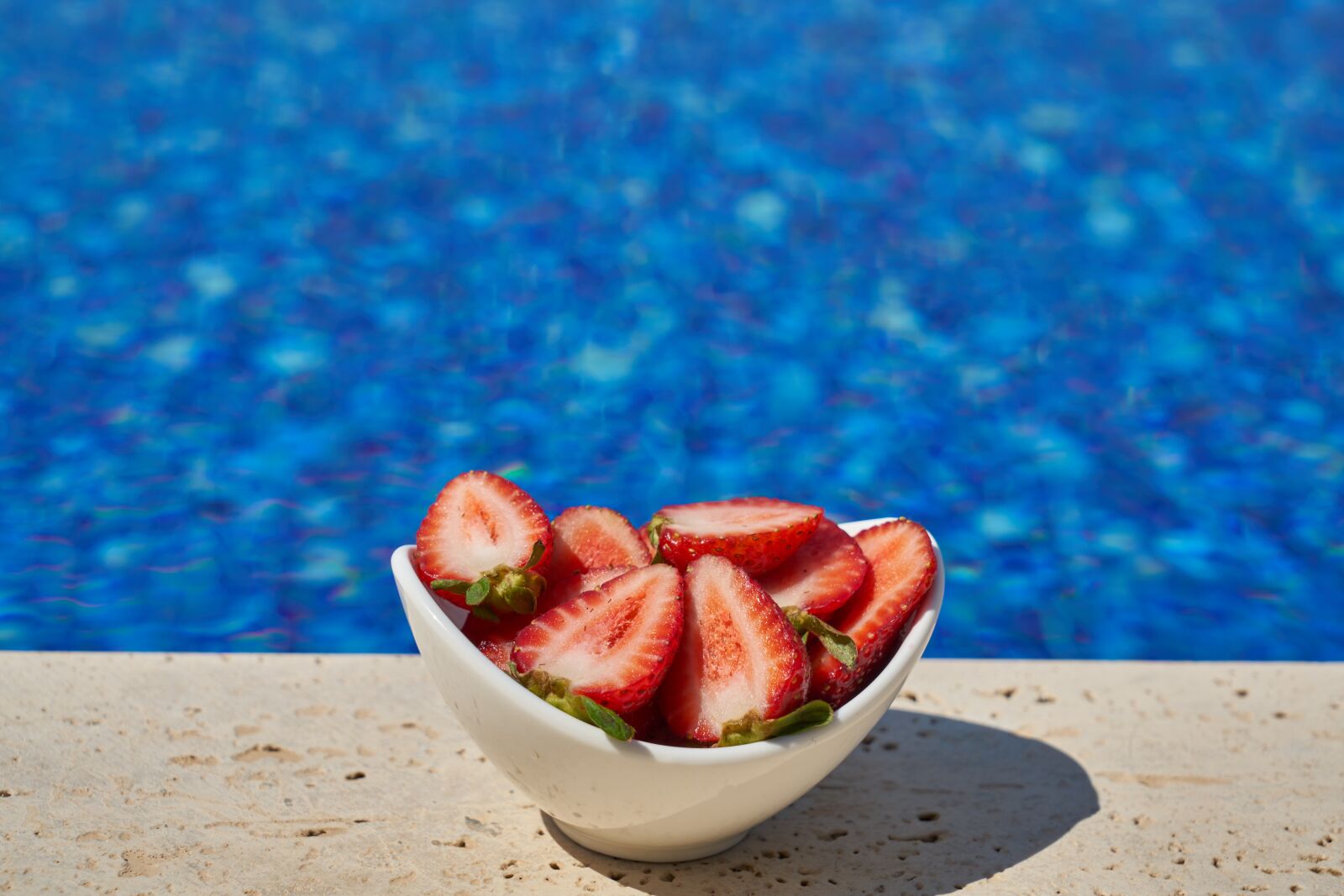 Sony a7R II sample photo. Strawberry, pool, fruit photography