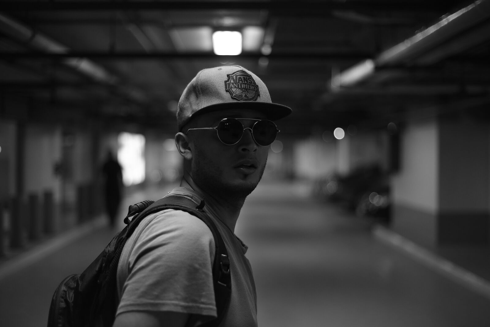 Canon EF 50mm F1.8 II sample photo. Action, adult, backpacking, basement photography