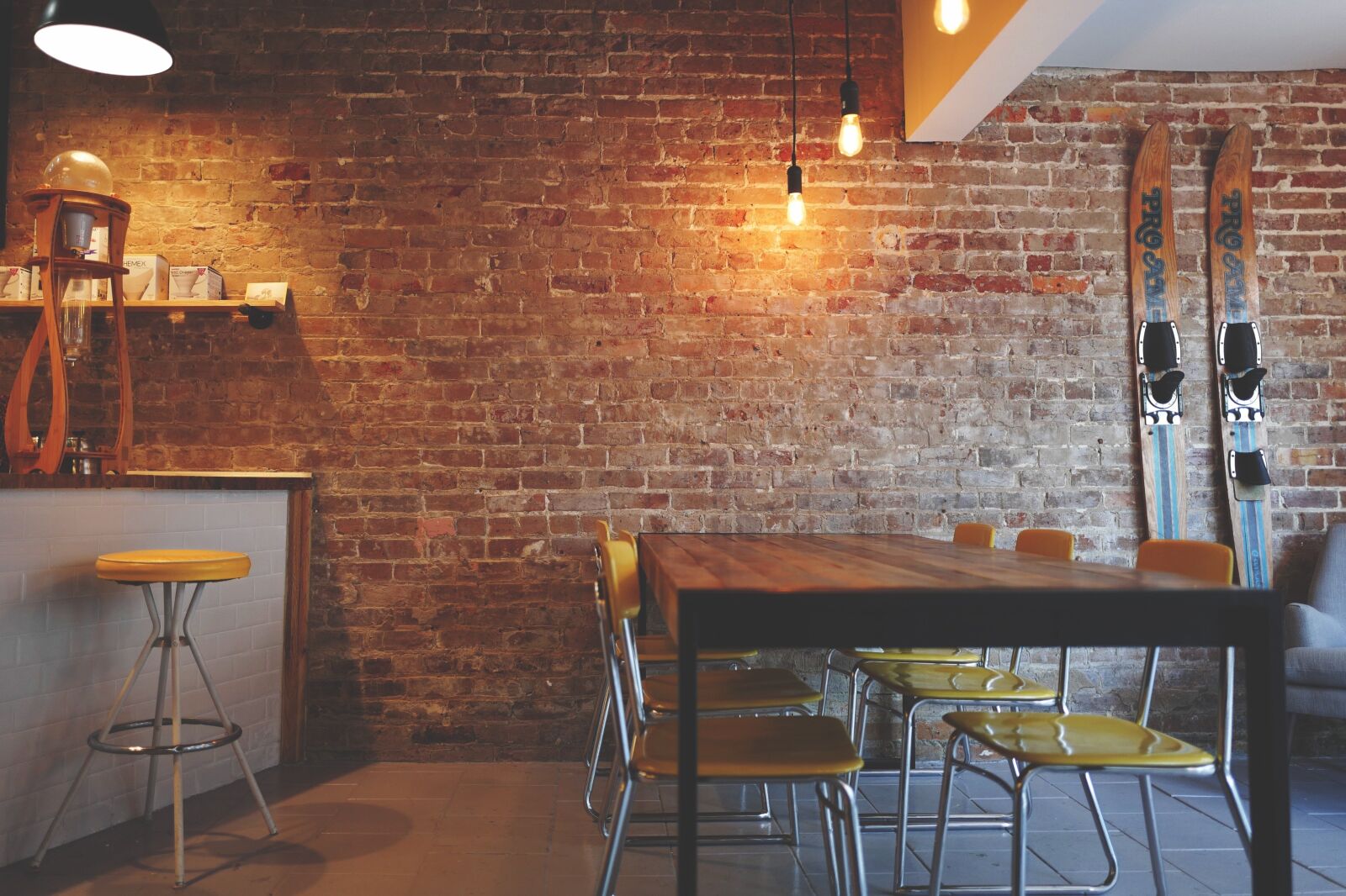 Leica Q (Typ 116) sample photo. Brick wall, chairs, furniture photography