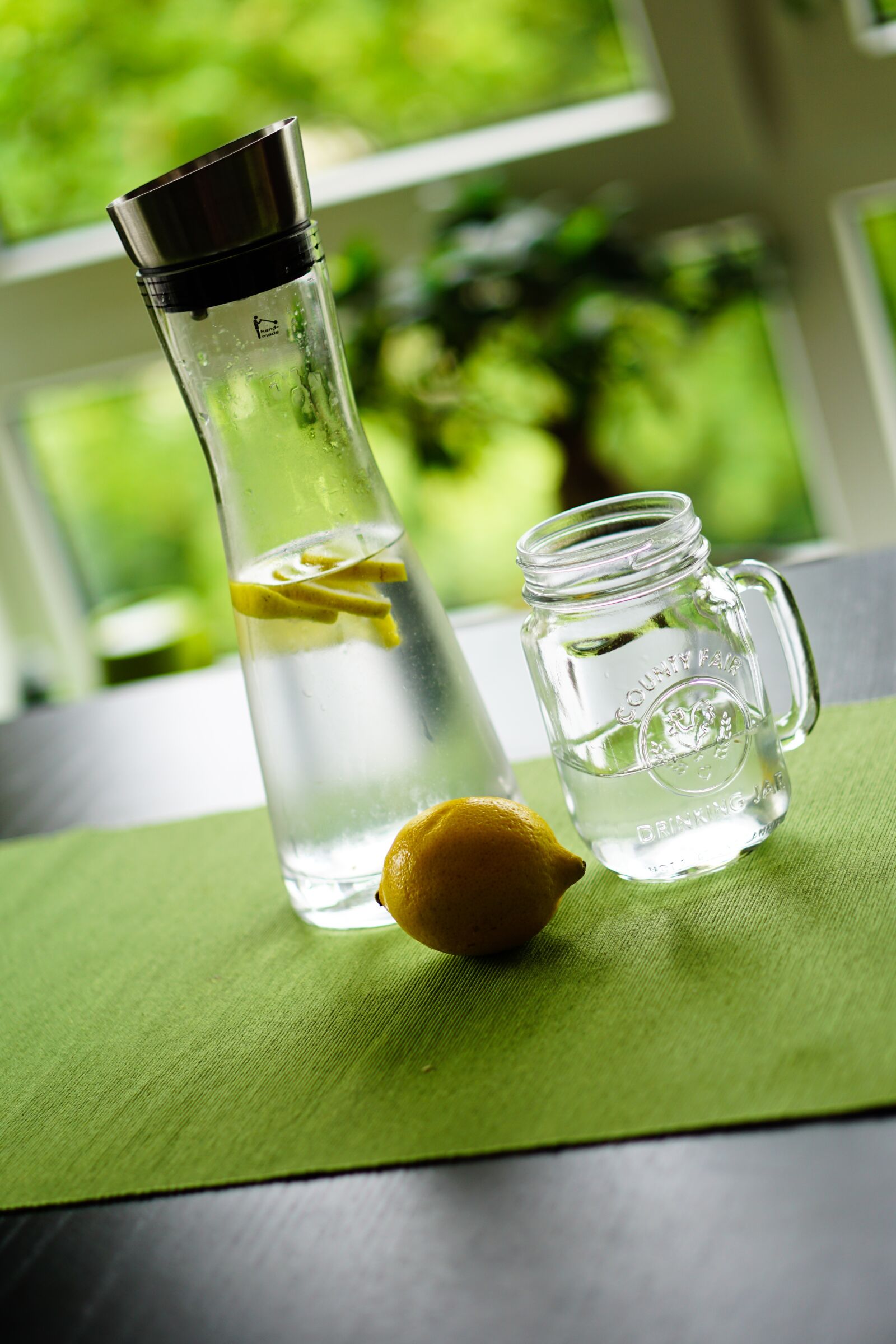 E 50mm F1.8 OSS sample photo. Lemon, water, refreshment photography