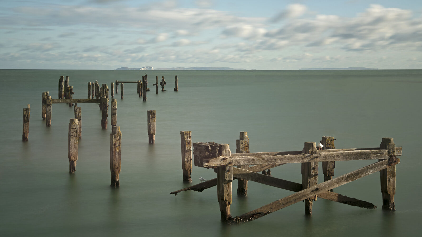 Nikon D810 sample photo. Calm, waters, pier, rotten photography