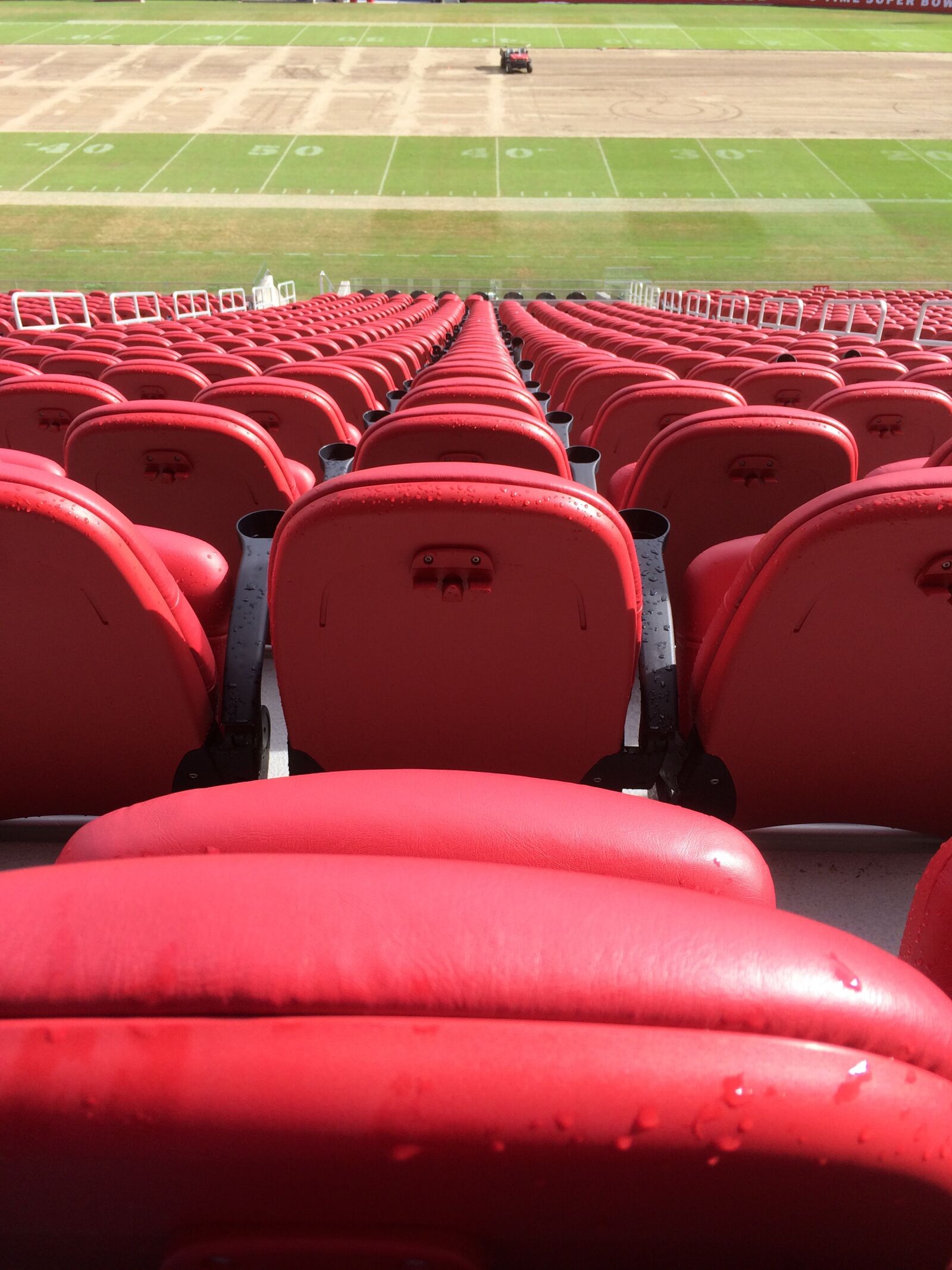 Apple iPhone 5s sample photo. Stadium seats, red, stadium photography