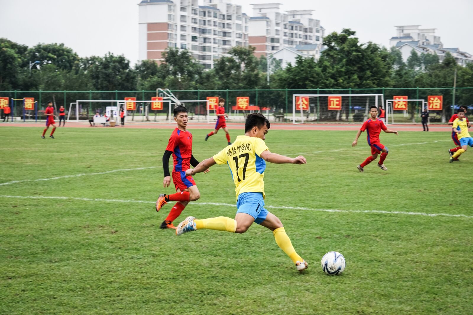 Sony E 55-210mm F4.5-6.3 OSS sample photo. Football, game, sports photography