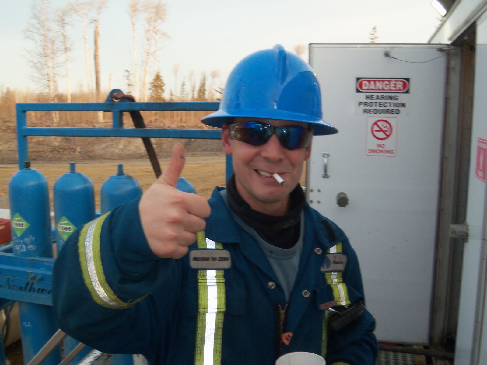 Kodak EASYSHARE TOUCH CAMERA, M577 sample photo. Roughneck, thumbs up, work photography
