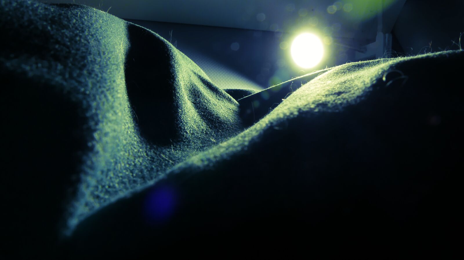 Panasonic Lumix DMC-FZ300 sample photo. Light, dark, pillow photography
