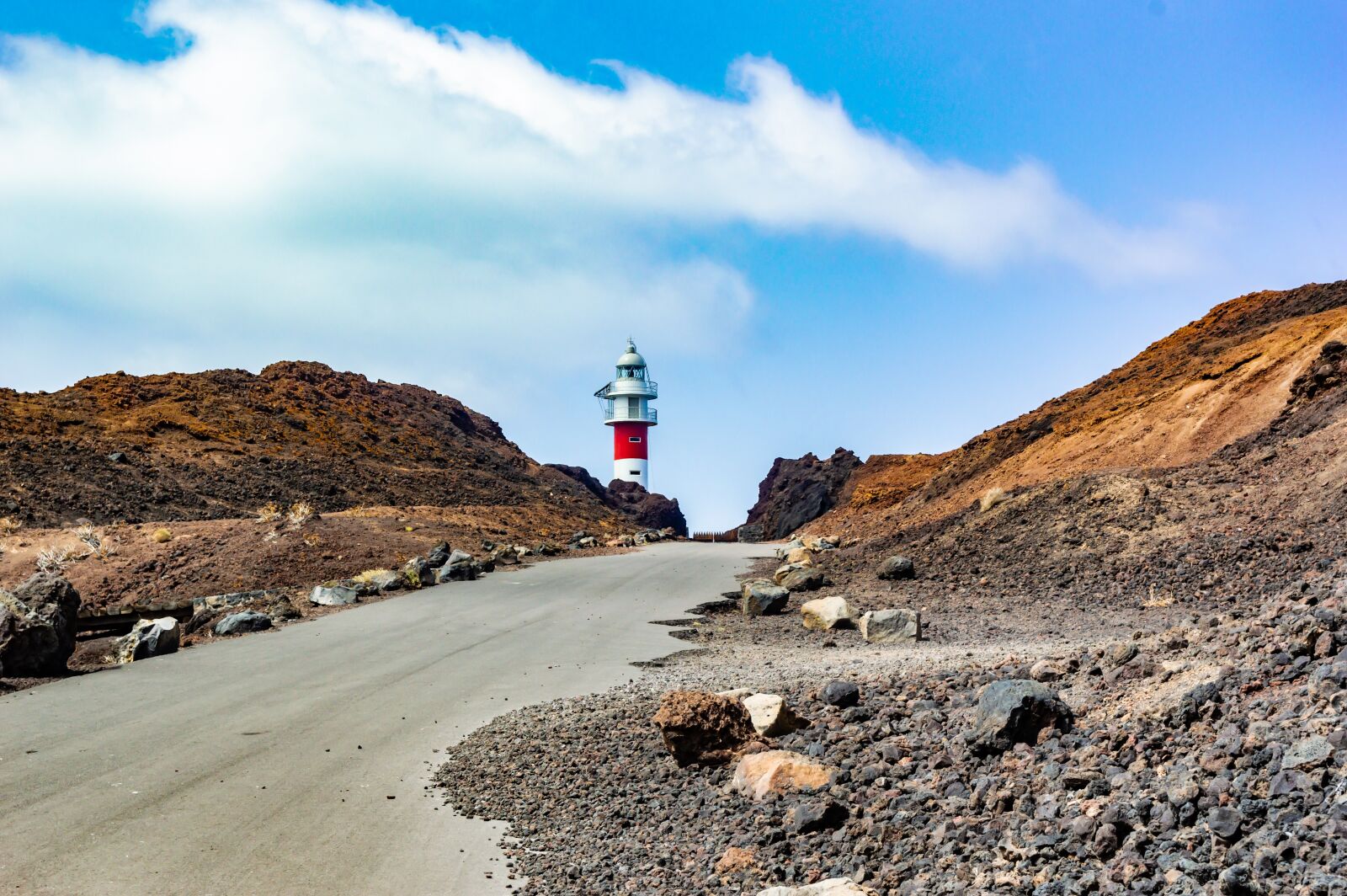 Nikon D3200 sample photo. Lighthouse, road, mountains photography