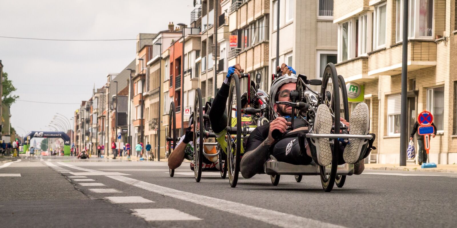 Olympus M.Zuiko Digital ED 75mm F1.8 sample photo. Cyclists, low bike, handbike photography