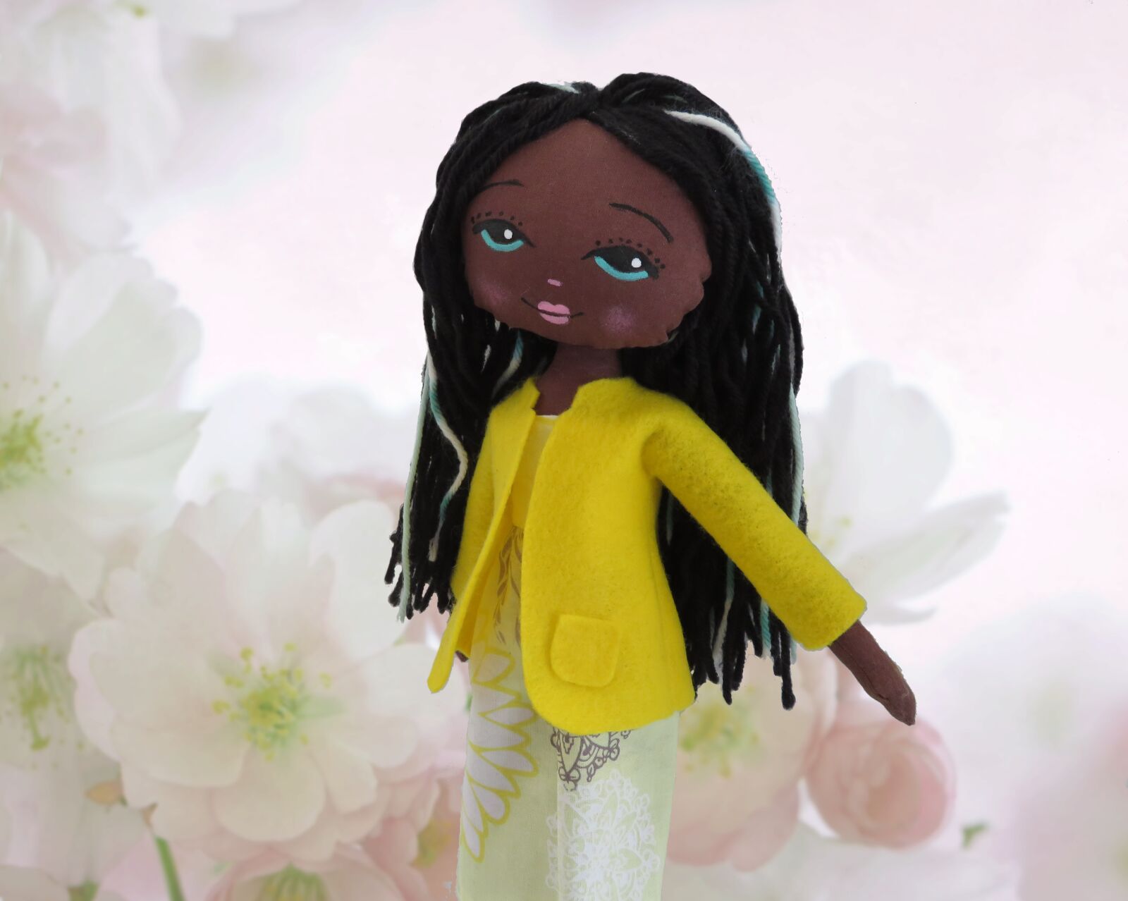 Canon PowerShot SX720 HS sample photo. Doll, black, toy photography