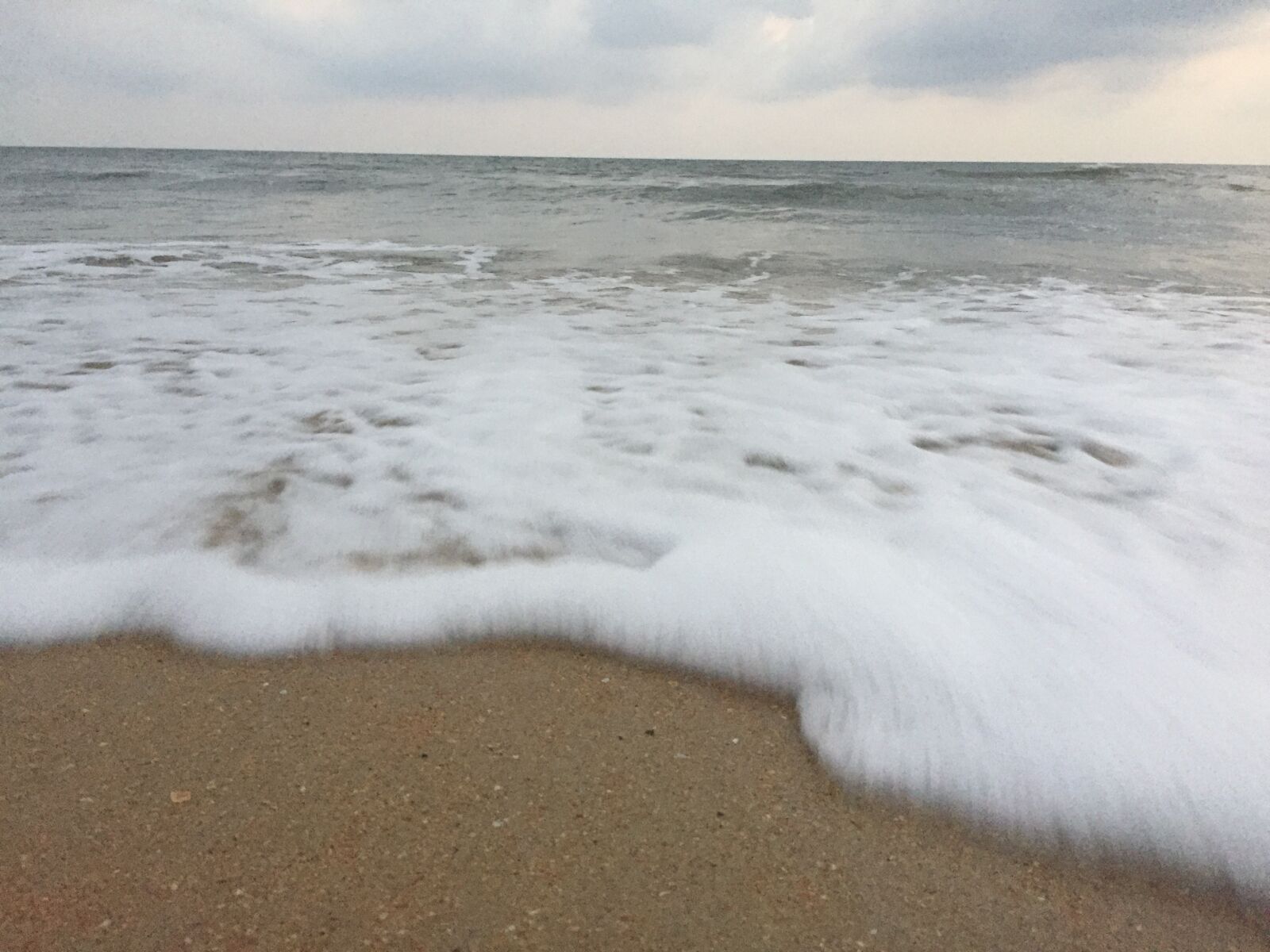 iPhone 6 back camera 4.15mm f/2.2 sample photo. Beach, water, shore, waves photography