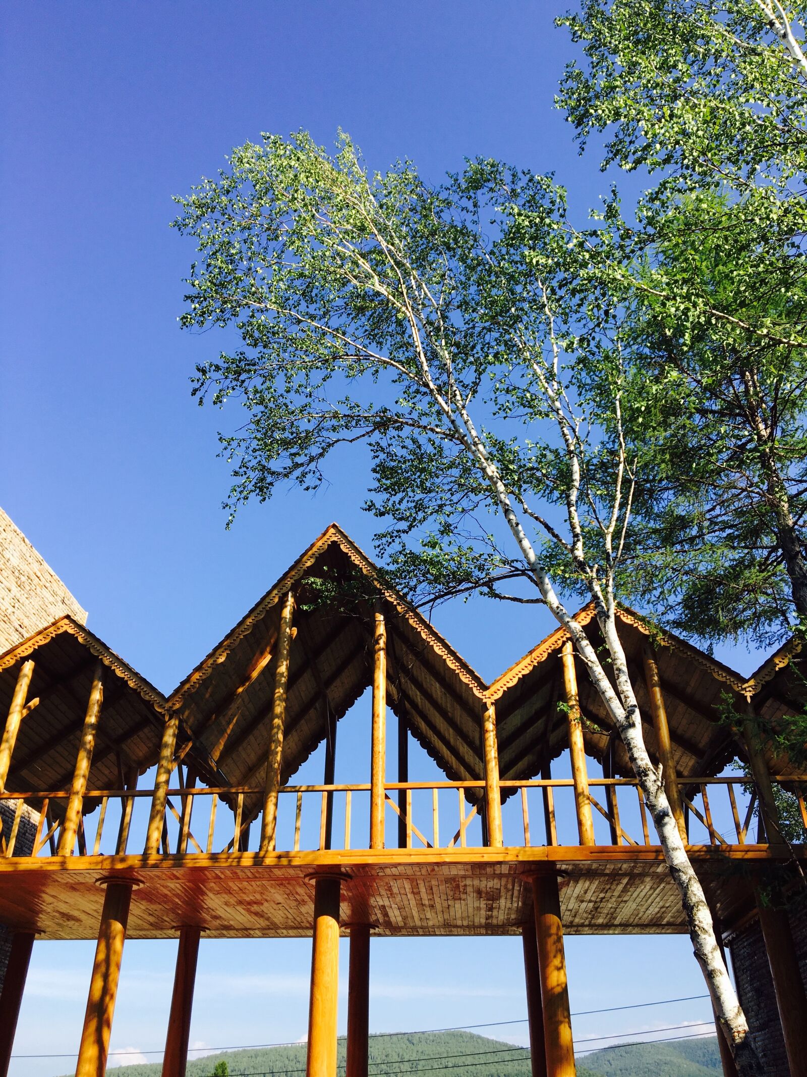 Apple iPhone 6s sample photo. Travel, hailar, log cabin photography