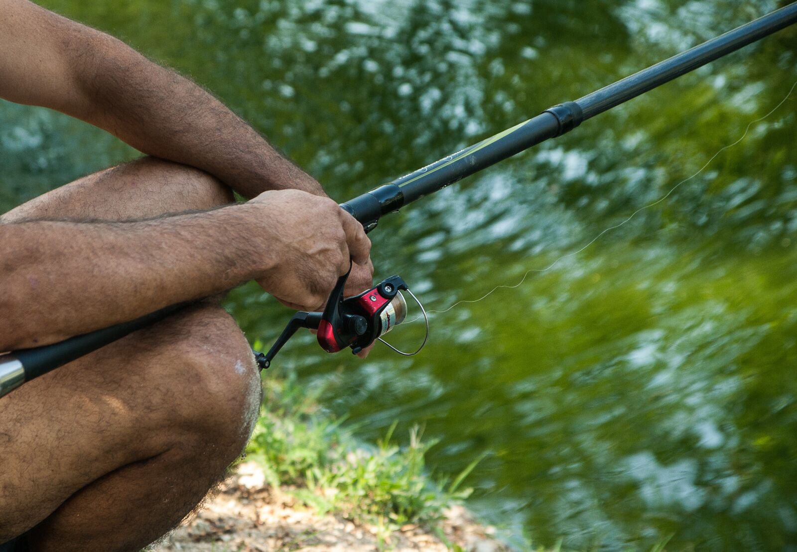 Pentax K10D sample photo. Fisherman, reel, angling photography