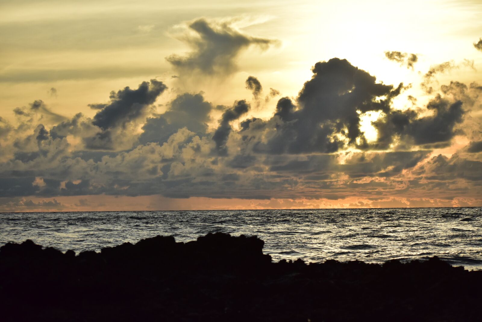 Nikon D3400 sample photo. Beach, clouds, rock photography