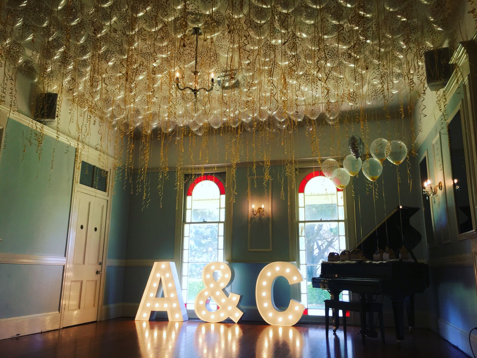 iPhone 6s back camera 4.15mm f/2.2 sample photo. A, c, ceiling, balloons photography