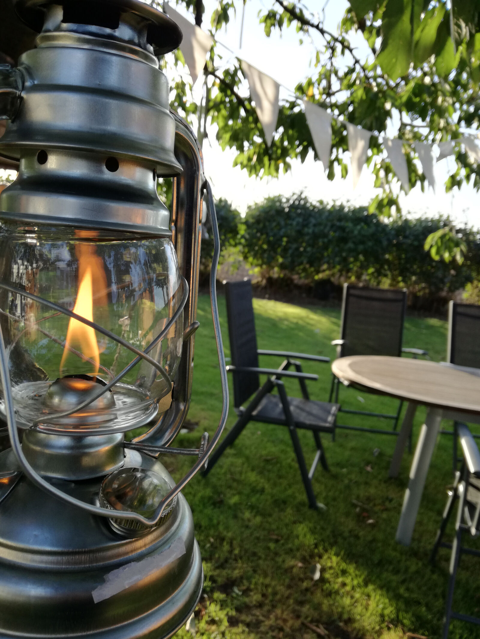 HUAWEI P9 LITE sample photo. Flame, garden, green, lantern photography
