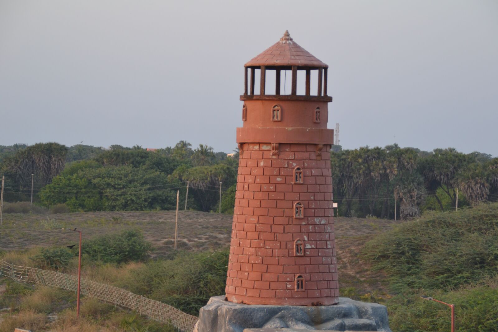 Nikon D3100 sample photo. Mini light house, sun photography