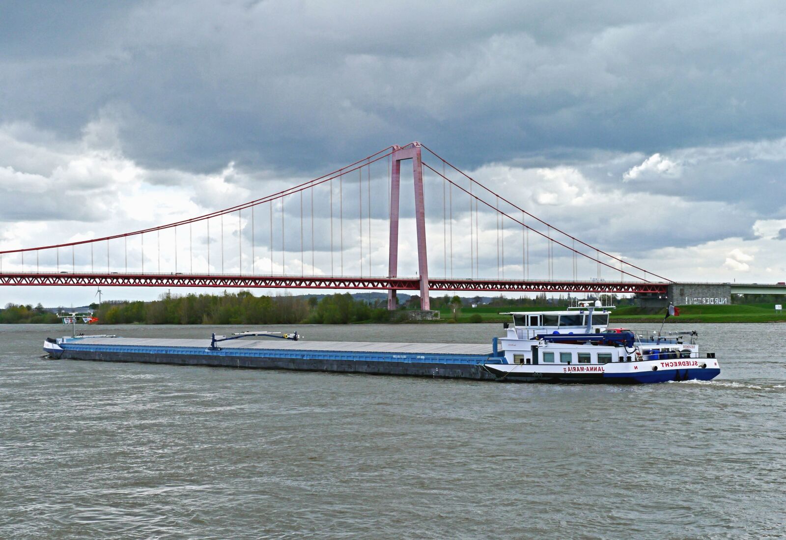Panasonic Lumix DMC-G3 sample photo. River, bridge, boat, water photography