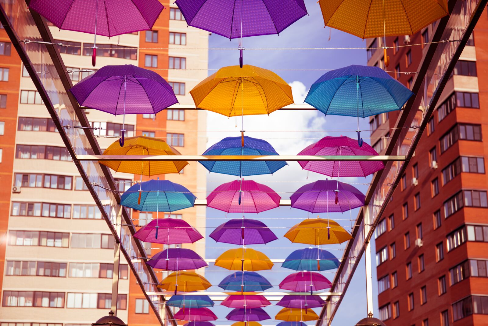 Canon EF 24-70mm F4L IS USM sample photo. Umbrellas, chekhov, bridge photography