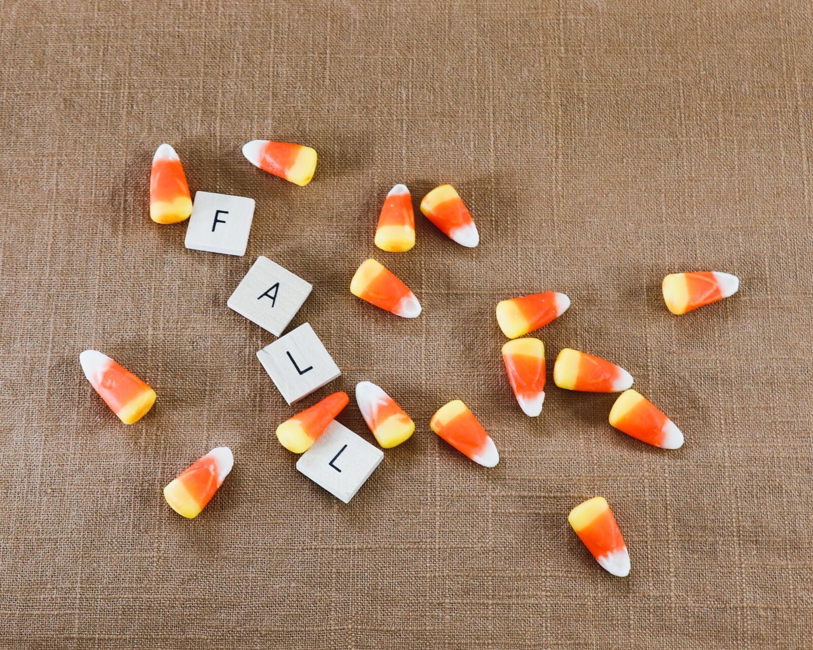 Canon EF-S 18-135mm F3.5-5.6 IS USM sample photo. Candy corn, flat lay photography