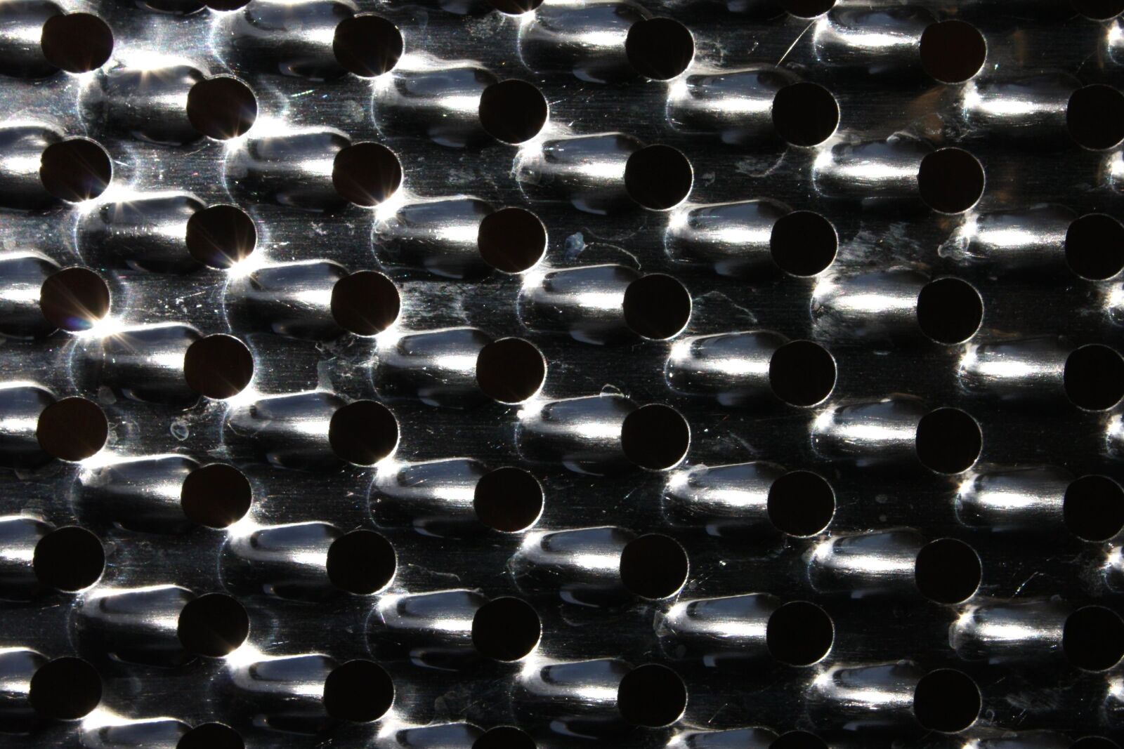 f/3.5-5.6 IS sample photo. Metal grater, texture photography
