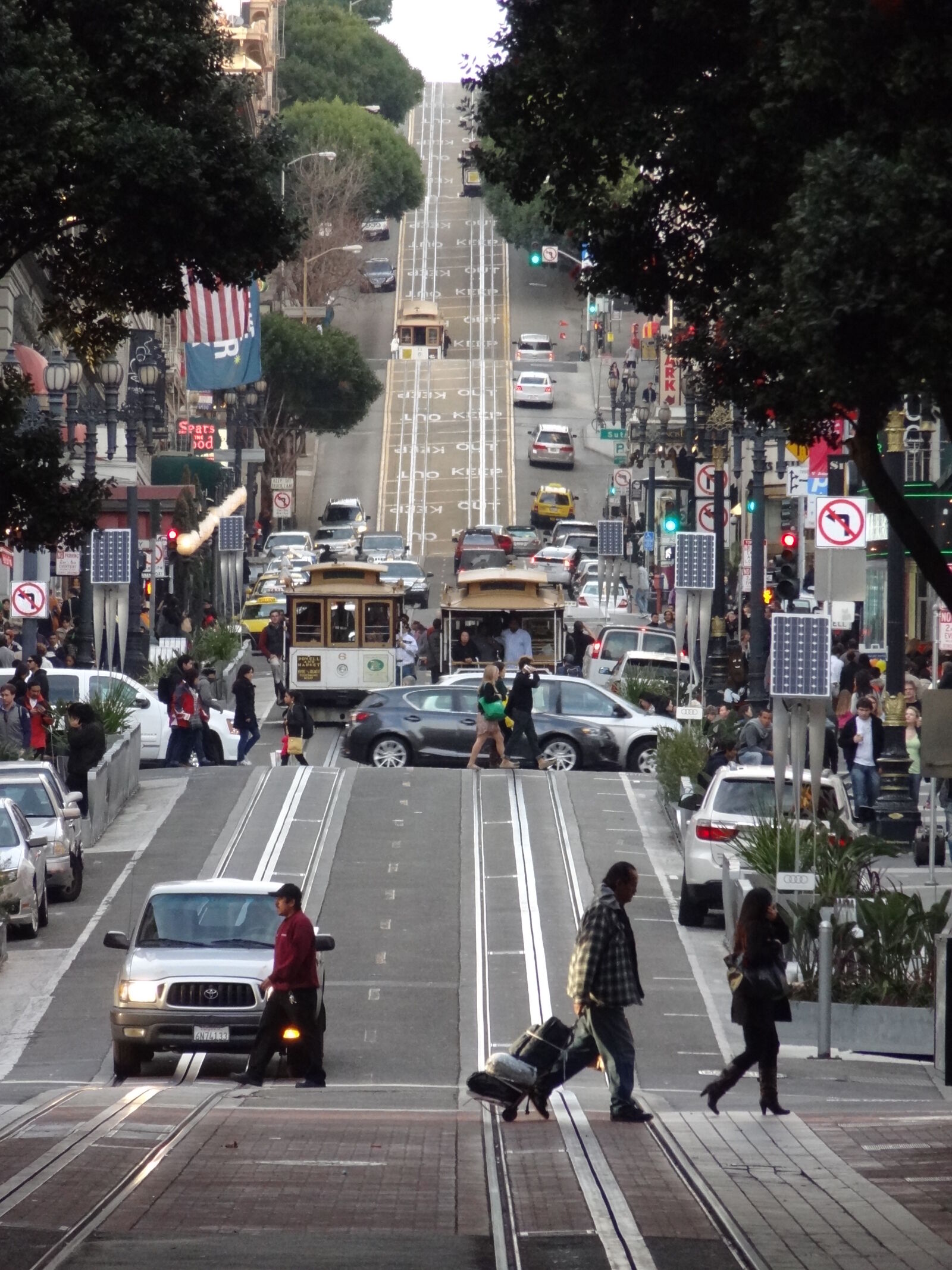 Sony Cyber-shot DSC-HX9V sample photo. Vehicles, on, city, street photography
