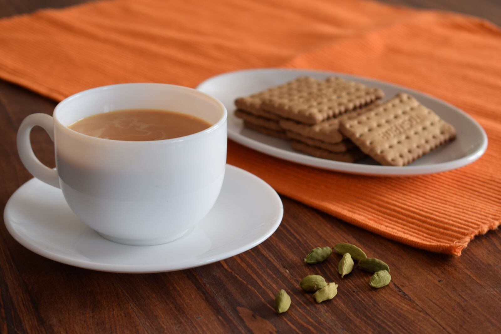 Nikon D5300 sample photo. Tea, biscuits, cardamom photography