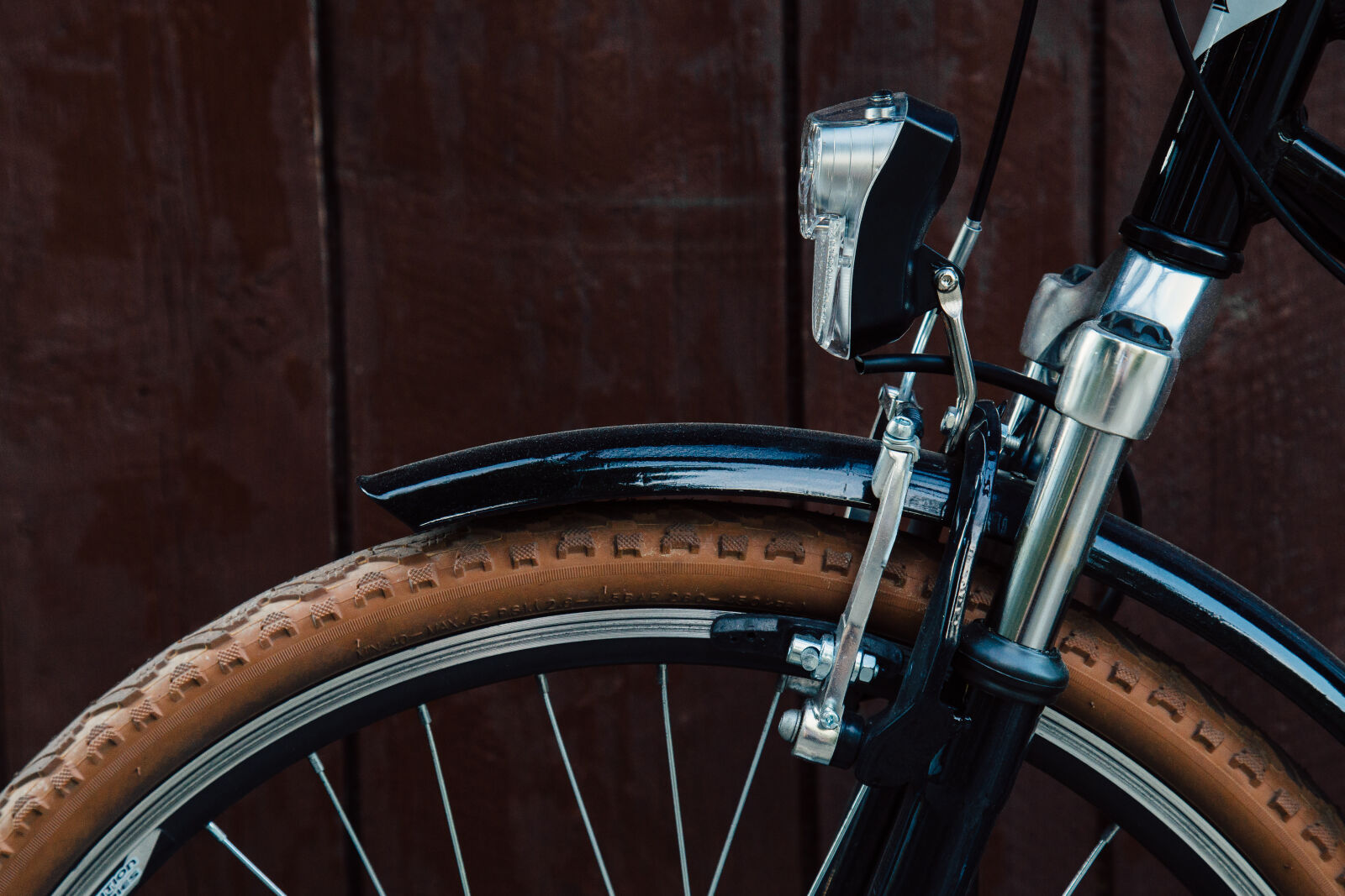 Canon EF 24-105mm F4L IS USM sample photo. Wood, light, bike, tire photography