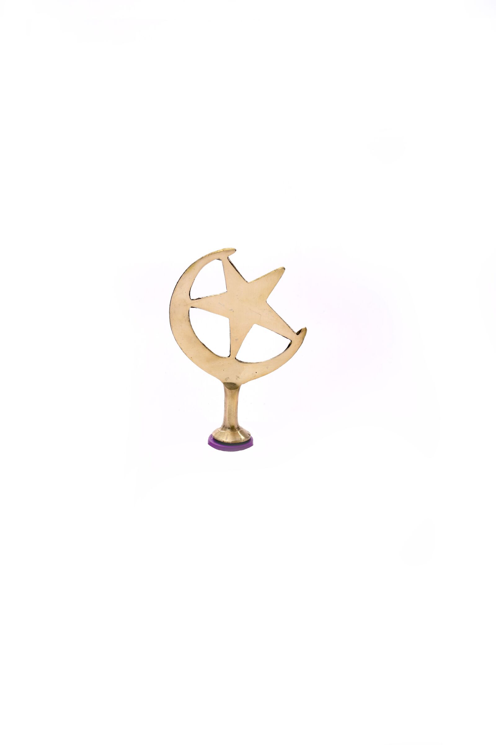 Nikon D850 sample photo. Moon, star, brass symbols photography