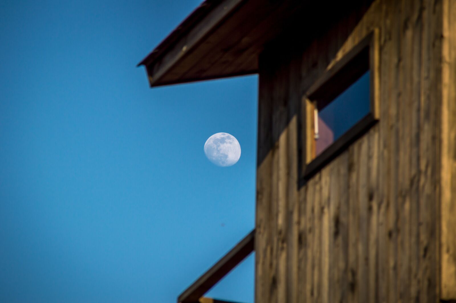 Tamron 18-200mm F3.5-6.3 Di II VC sample photo. Moon, watchtower, dusk photography