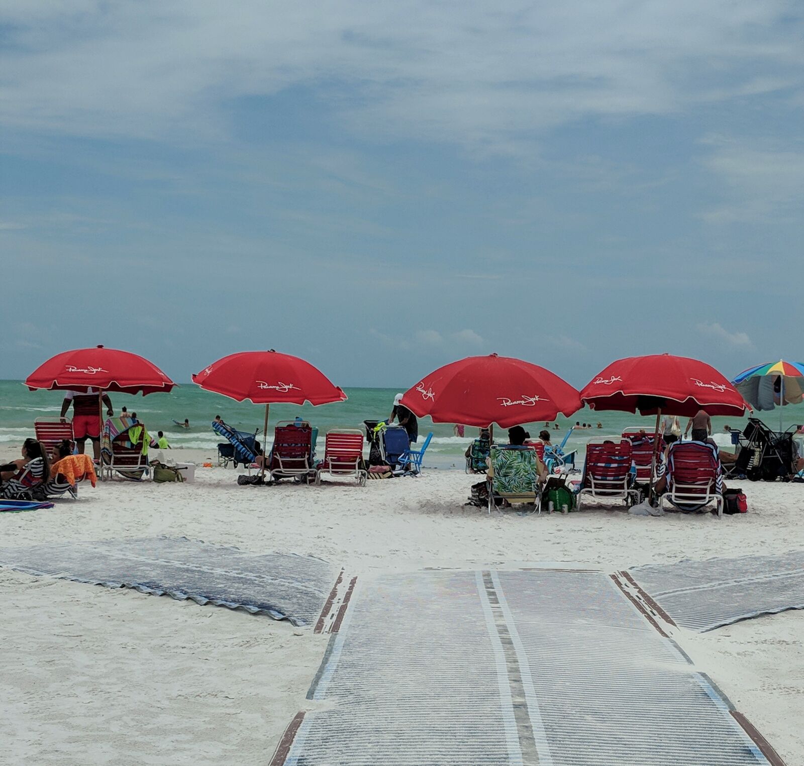 Google Pixel 2 XL sample photo. Beach umbrellas, red beach photography