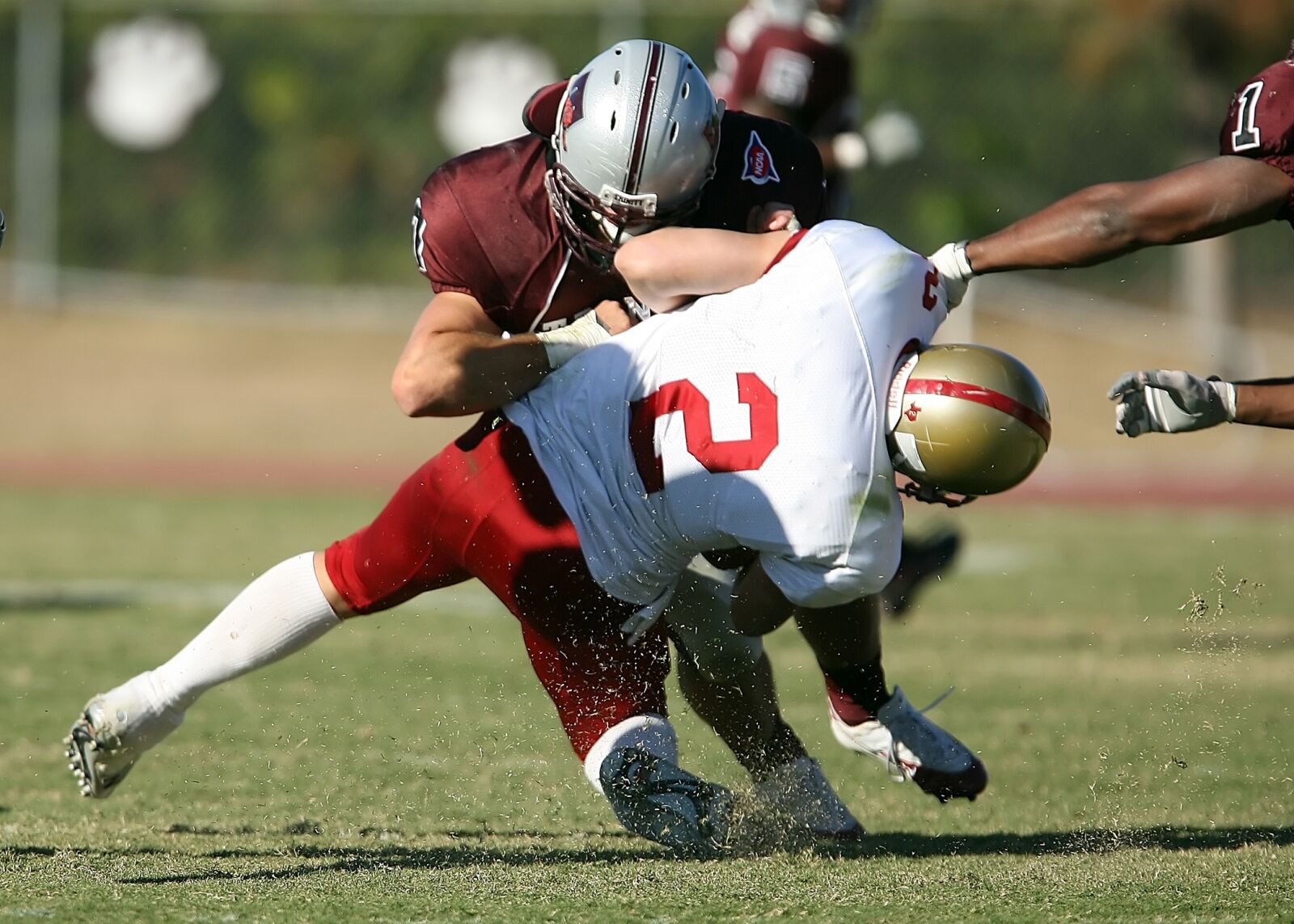 Canon EOS-1D Mark II N sample photo. American football, quarterback sack photography