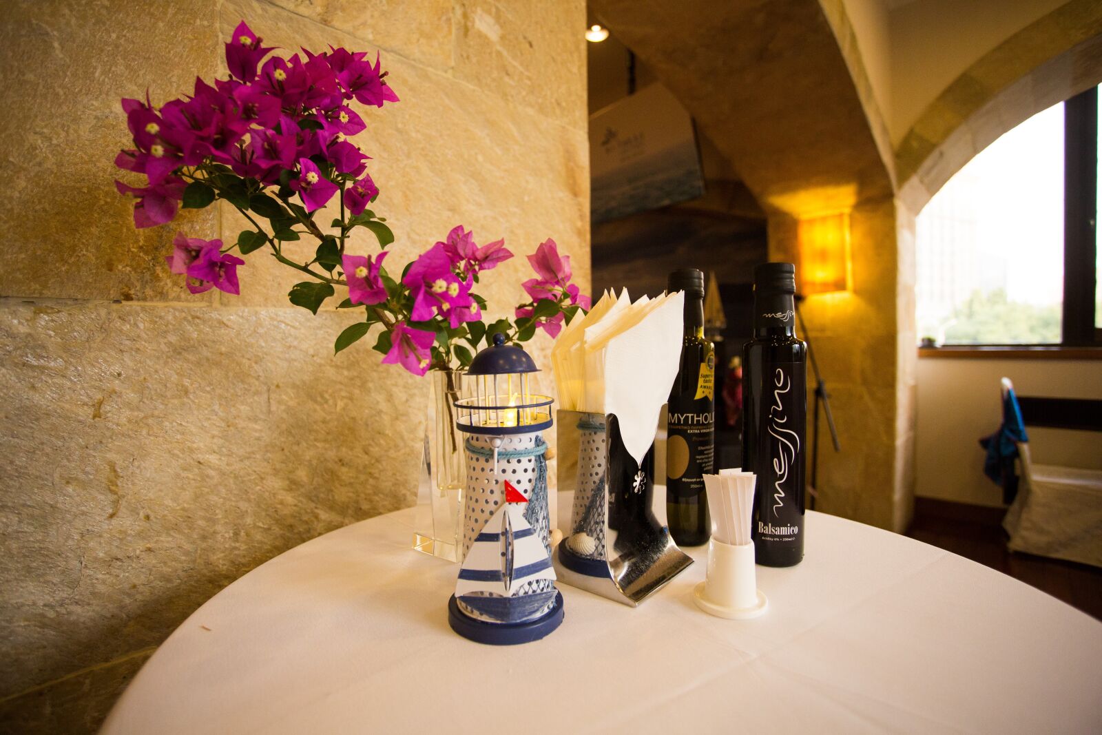 Canon EF 17-40mm F4L USM sample photo. Olive oil, bougainvillea, lighthouse photography
