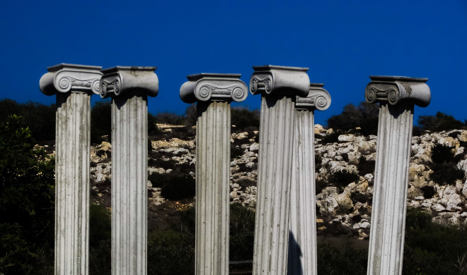 Canon PowerShot SX400 IS sample photo. Pillar capitals, greek, architecture photography