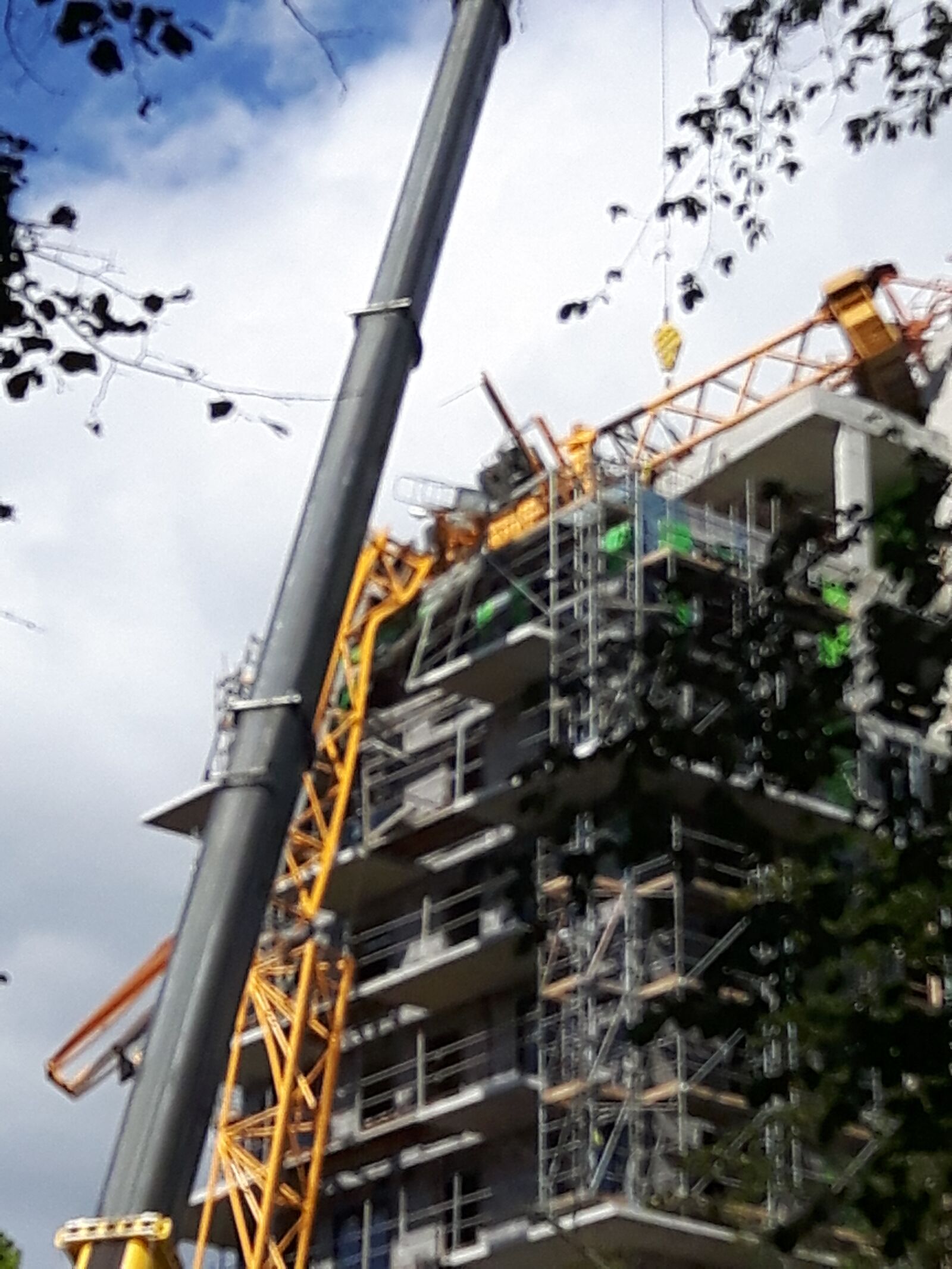 Samsung Galaxy S5 Neo sample photo. Crane on building, storm photography