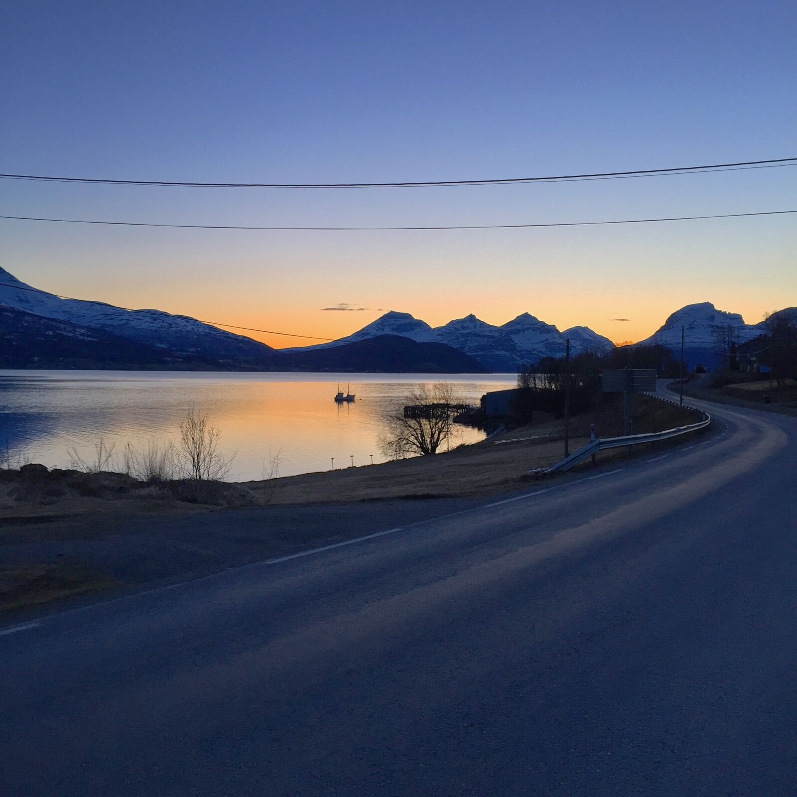 Apple iPhone 6 sample photo. Boat, coast, mountains, fjord photography