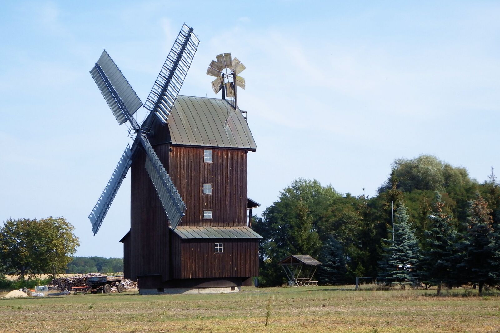 Fujifilm FinePix SL1000 sample photo. Windmill, trees, meadow photography