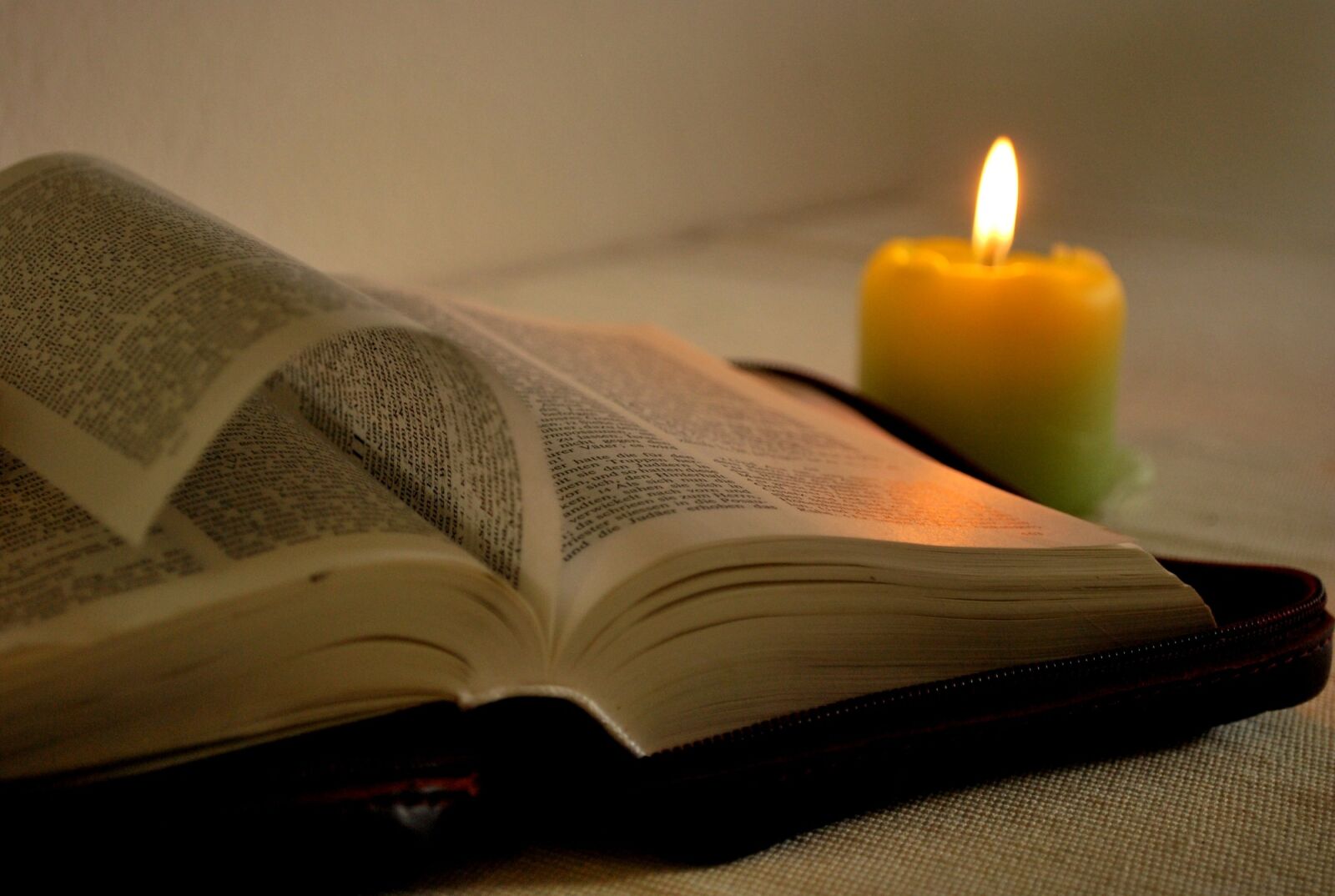 Nikon D60 sample photo. Read, book, candle photography